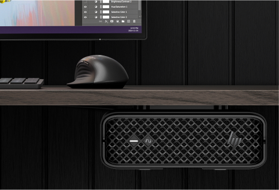 Set it on or under your desk, and behind your monitor.